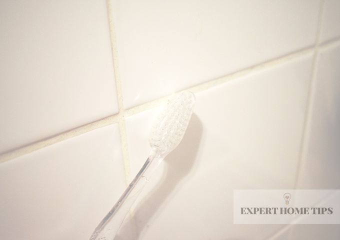 clean grout used toothbrush