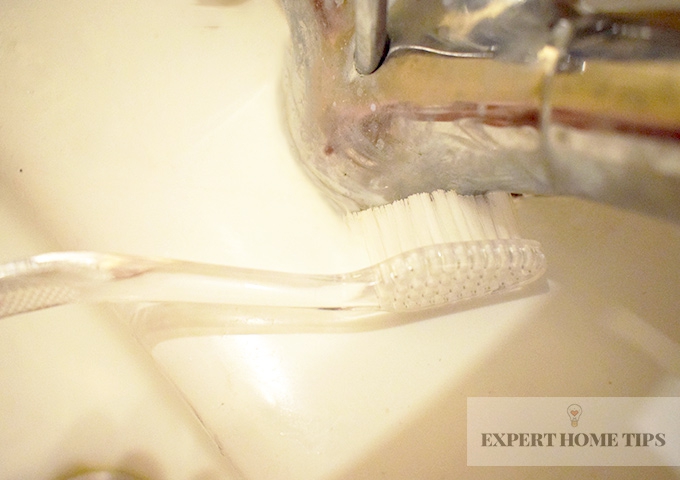 used toothbrush cleaning taps