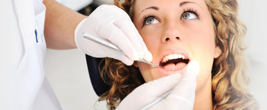 как укрепить передний зуб
