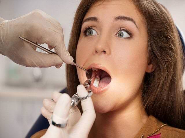 удаление зуба 